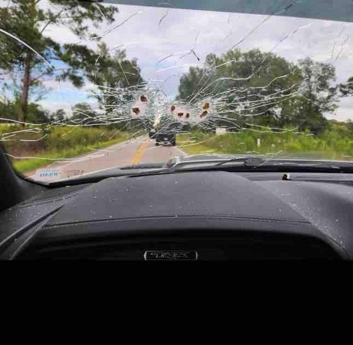 Bullet holes can be seen in the windshield from the inside of Weldon Boyd’s truck. Boyd and Kenneth “Bradley” Williams shot and killed Scott Spivey, of Tabor City, North Carolina, in what police described as a road rage incident. The two men’s actions have been determined to be self-defense under South Carolina’s Stand Your Ground law. The two are now facing a wrongful death lawsuit by Spivey’s family.