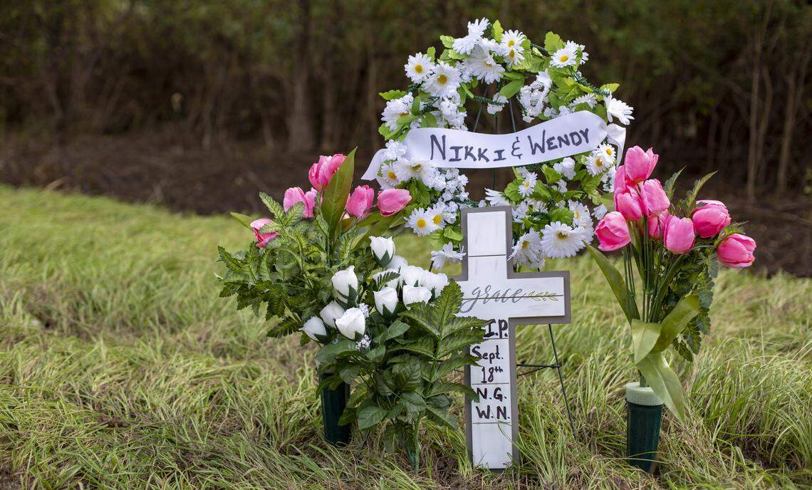 A memorial sits on the side of U.S. Highway 76 in Marion County in honor of Nicolette Green and Wendy Newton of Shallotte, N.C. Horry County Sheriff’s deputies were transporting Green and Newton from Conway to medical facilities in Darlington and Lancaster when the transport van was swept into floodwaters along Highway 76.