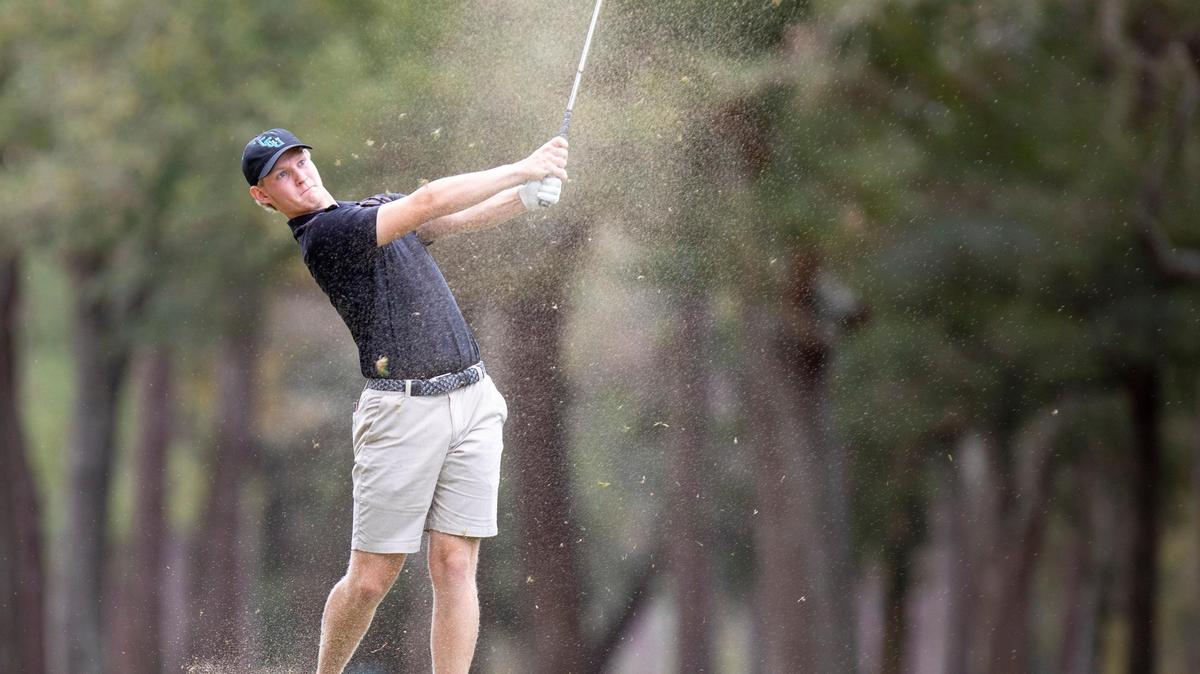 Coastal Carolina freshman golfer Tyler Gray takes a shot down the fairway Monday during the General Hackler Championship at The Dunes Beach and Golf Club in Myrtle Beach.