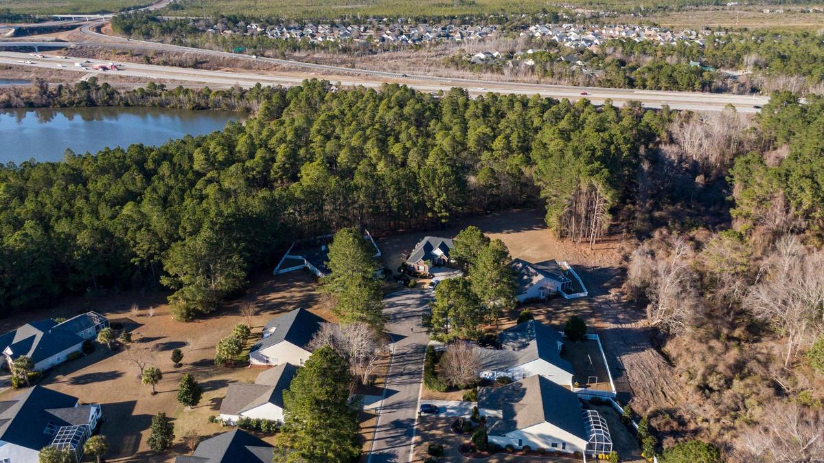 Residents living along Whooping Crane Lane in Barefoot Landing in North Myrtle Beach, S.C. are concerned with recent land clearing close to their homes. A narrow strip of timbered forest separates the homes from U.S. Highway 31, and residents say they’ve notice increased noise pollution since trees have been cut along the borders of their property. February 09, 2022.