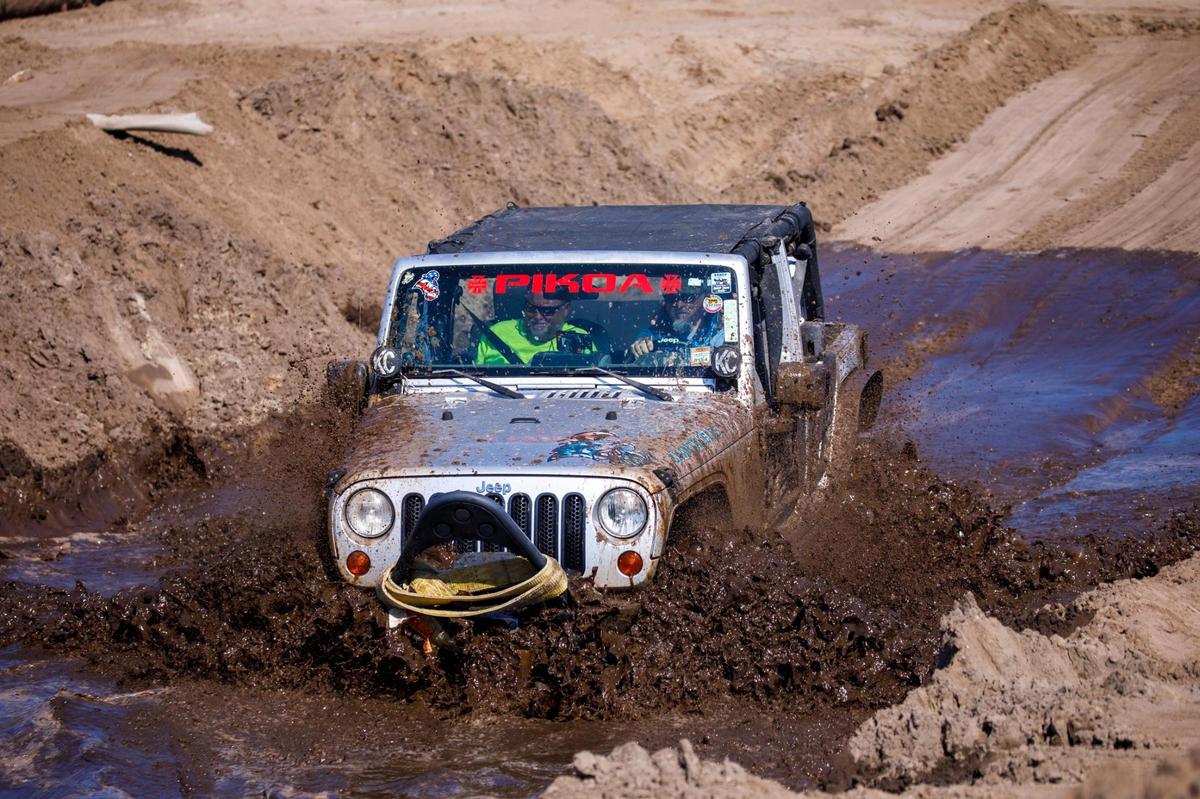 Jeep Jam volunteer, “Hippy” Mike Rabon, tests his jeep in the mud pit prior this weekend’s Jeep Jam event. Preparations are being completed today for the 2024 Jeep Jam event being held at the former Myrtle Square Mall site this weekend in Myrtle Beach. The event features a range of obstacles for Jeep owners to test their vehicles. Oct. 24, 2024.
