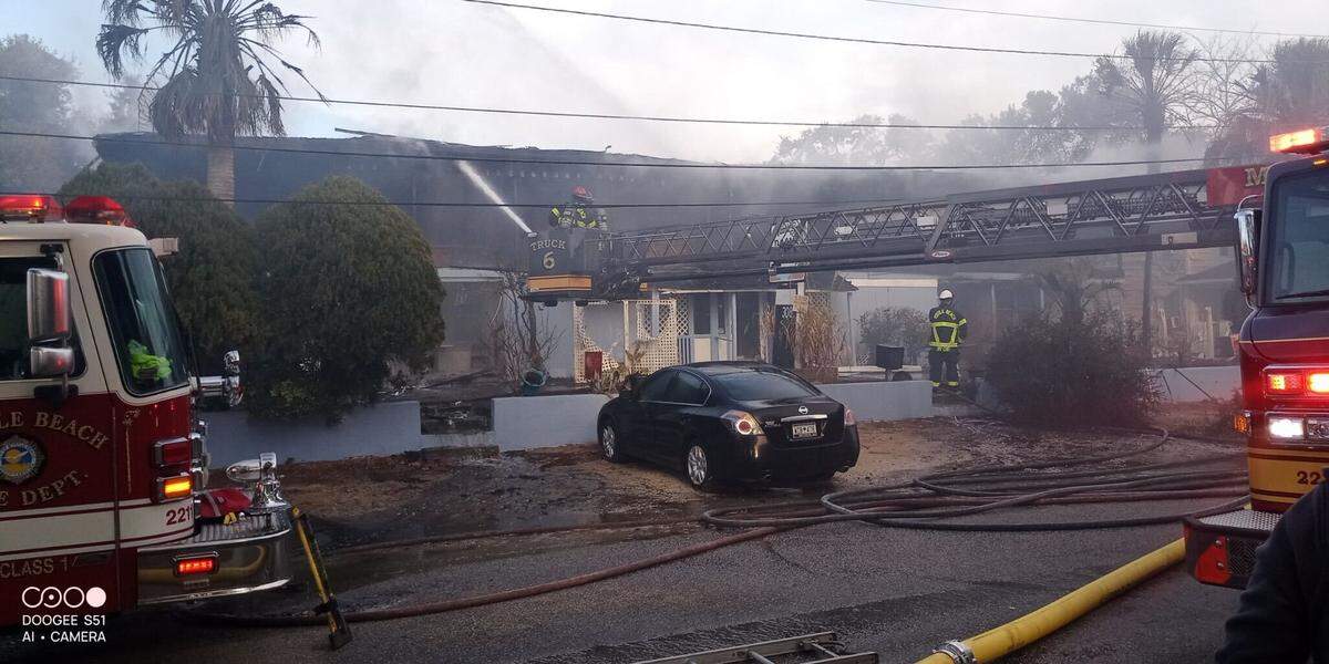 Myrtle Beach Fire Rescue puts out a fire at the Atlantic Sands on Christmas Day.