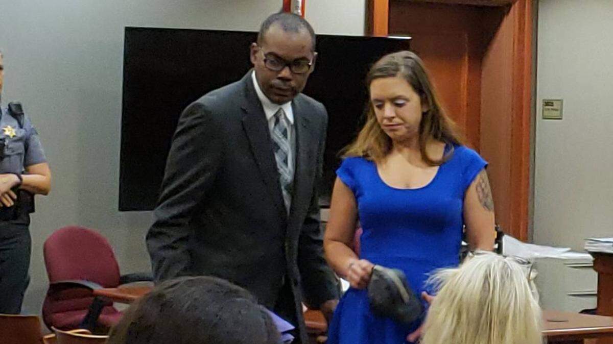 Lindsey Honeycutt leaves the courtroom after pleading guilty in August to charges related to sex-crimes against her children.