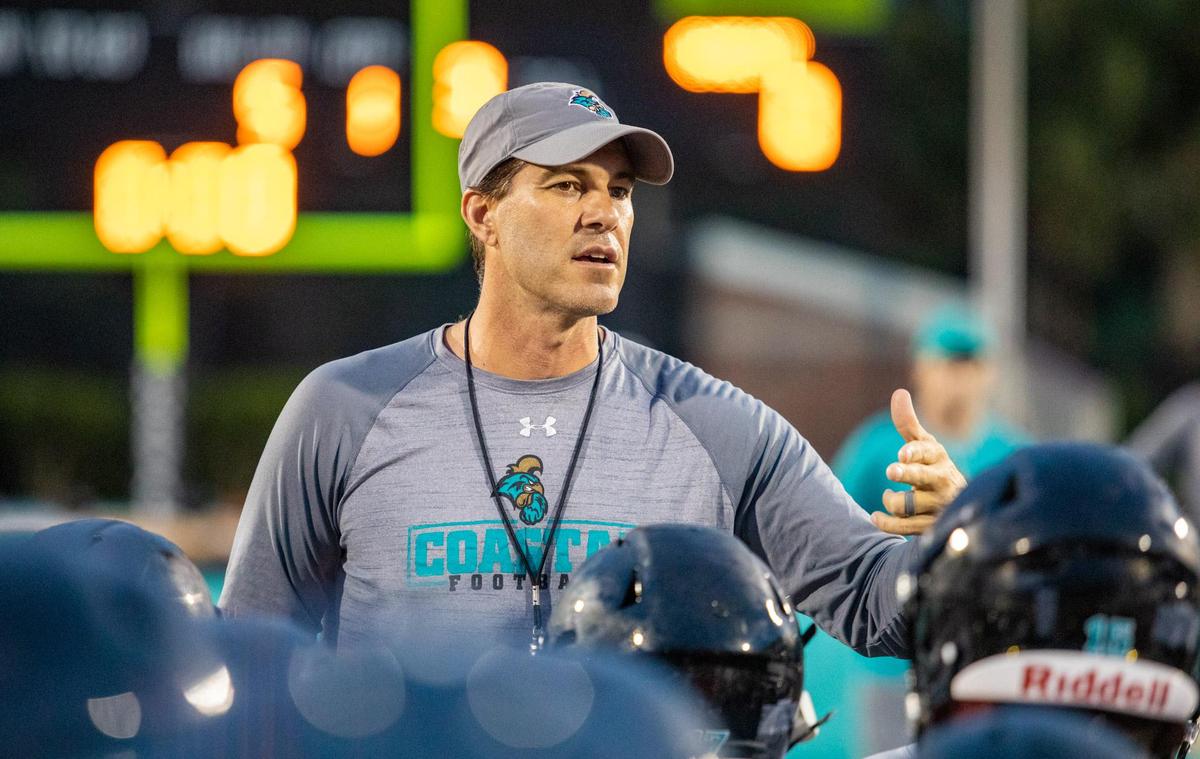 Coastal Carolina head coach Jamey Chadwell speaks with his players during practice on Aug. 2, 2019 at Brooks Stadium in Conway.