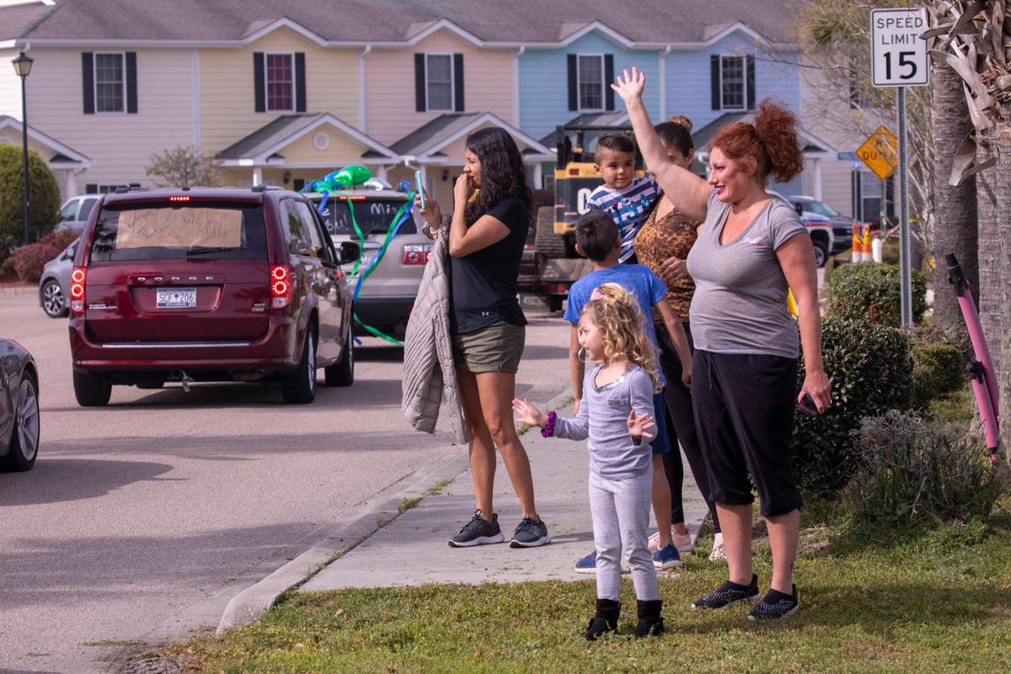 Teachers and staff from Burgess Elementary School decorated their cars and paraded through their student’s communities on Monday, March 23, 2020 honking their horns and waving from a safe distance to let the students know they were missed during the coronavirus recess.