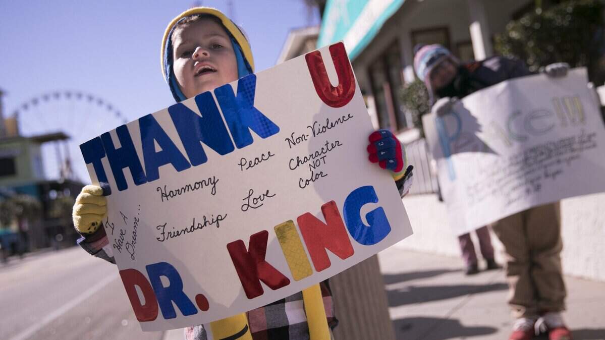 Despite frigid temperatures, a diverse group of participants marched along Ocean Boulevard to celebrate Martin Luther King Jr. Day in Myrtle Beach on Monday. Jan 21, 2019.