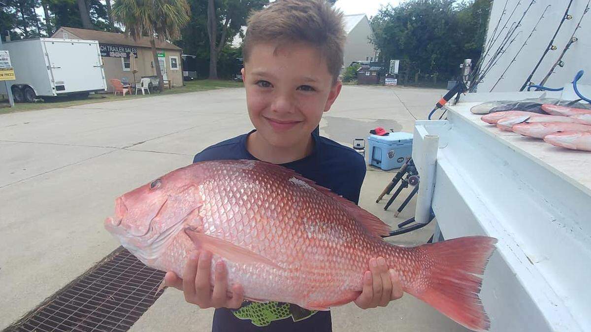A young angler displays a red snapper caught last weekend while fishing with Aces Up Fishing and Capt. Jay Sconyers out of Murrells Inlet. The 2018 red snapper mini-season continues this weekend, Friday through Sunday.