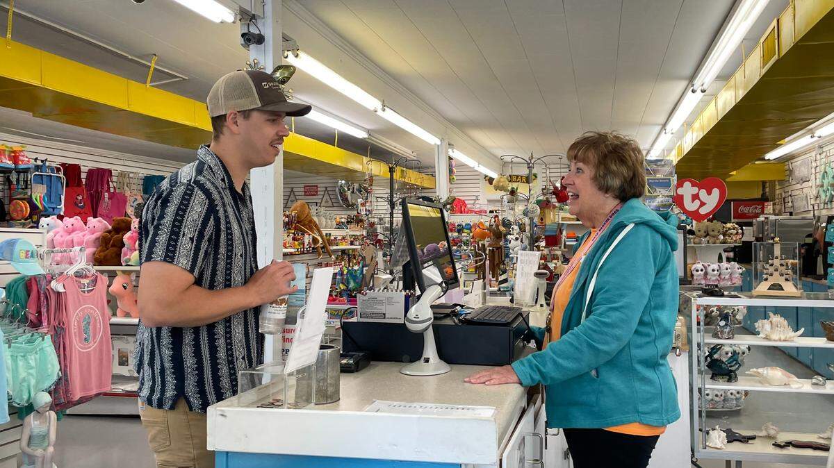 Luke Lowder talks with Carol Anderson at the trading post at Apache Family Campground and Pier in Myrtle Beach. It’s one of the sites for his new film, “The Grand Strand.” Lowder would often go to the trading post during his summers at the campground, buying a Monster drink and a Payday candy bar. Anderson had been vacationing at the campground for 25 years before moving there permanently nine years ago.