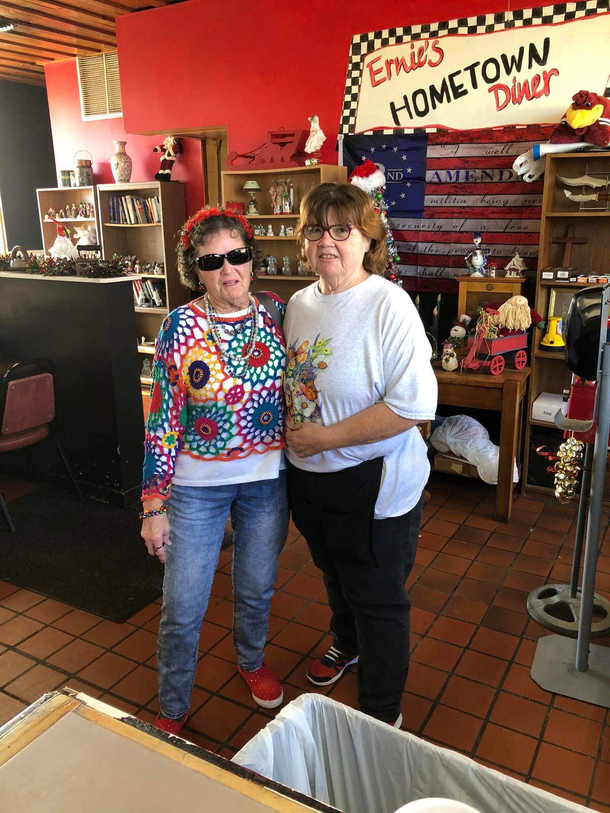 Mary Ward, left, and her daughter Tammy Ward, right, standing in Ernie’s Hometown Diner
