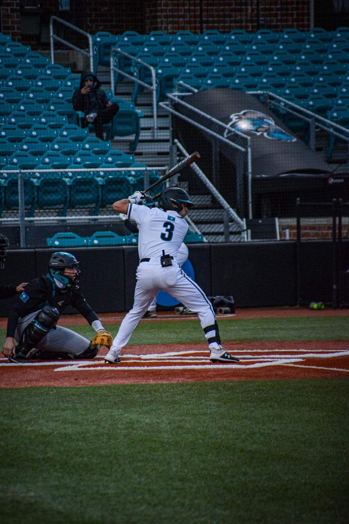 Coastal Carolina outfielder Parker Chavers takes part in an intrasquad scrimmage during preseason practices in February 2021.