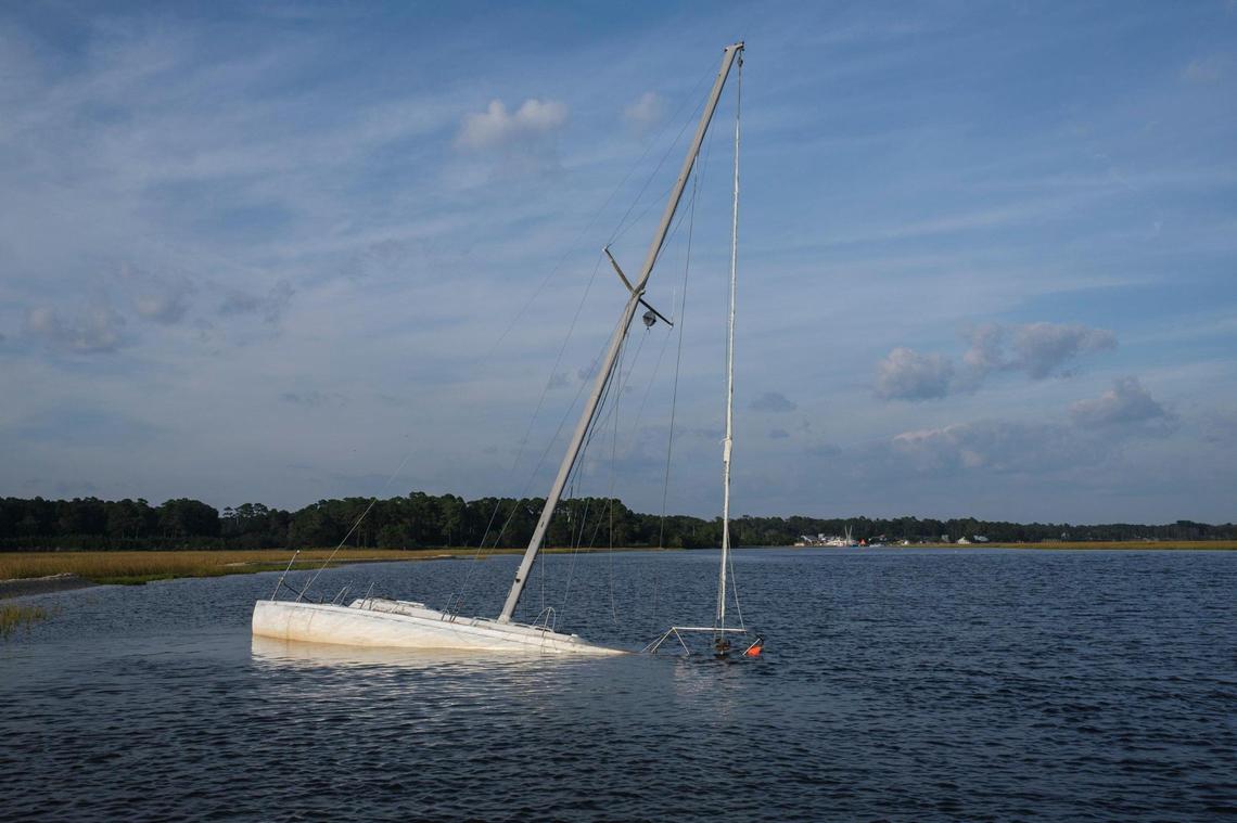 An abandoned sailboat lay on it’s side in the Calabash River near the North Carolina line. This boat as well as three others were removed from an area known as the “Crossroads” last week in a joint effort between the SCDNR, the conservation group Wounded Nature Working Veterans and volunteers from Black Water Dredging. Oct. 14, 2021.