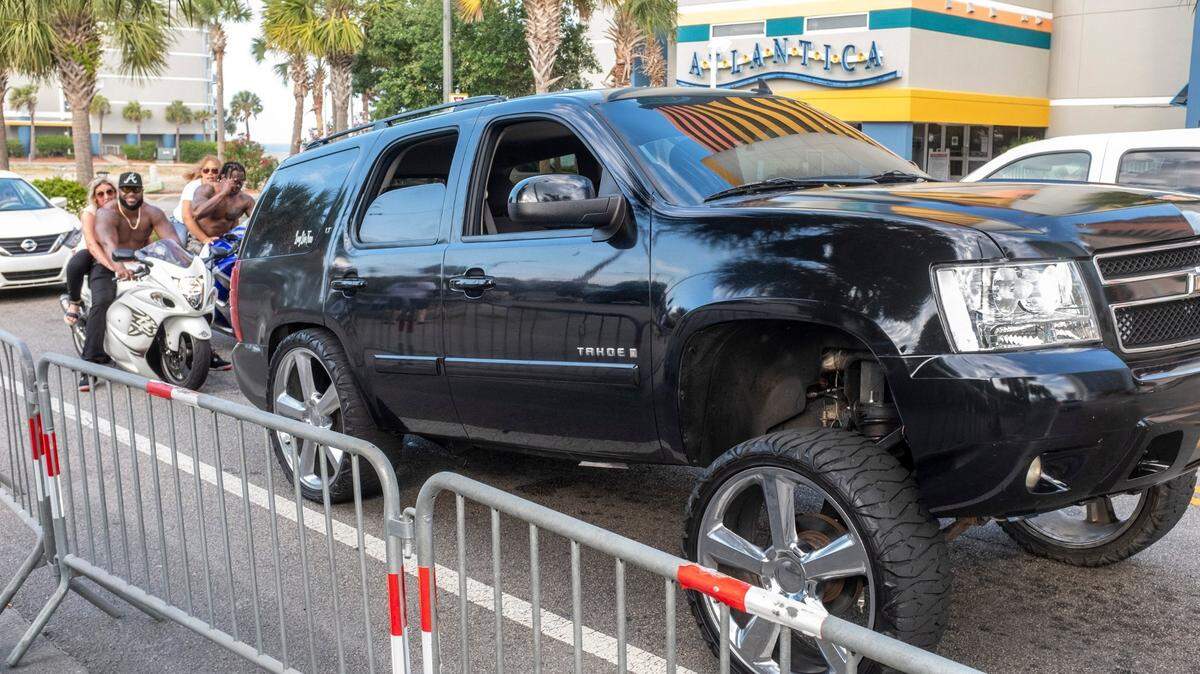 A modified truck cruises Ocean Boulevard in Myrtle Beach during Memorial Day weekend 2021. May 29, 2021. The S.C. legislature is considering a ban on the lifting of vehicle’s front ends more than four inches above the rear commonly known as the “Carolina Squat.”