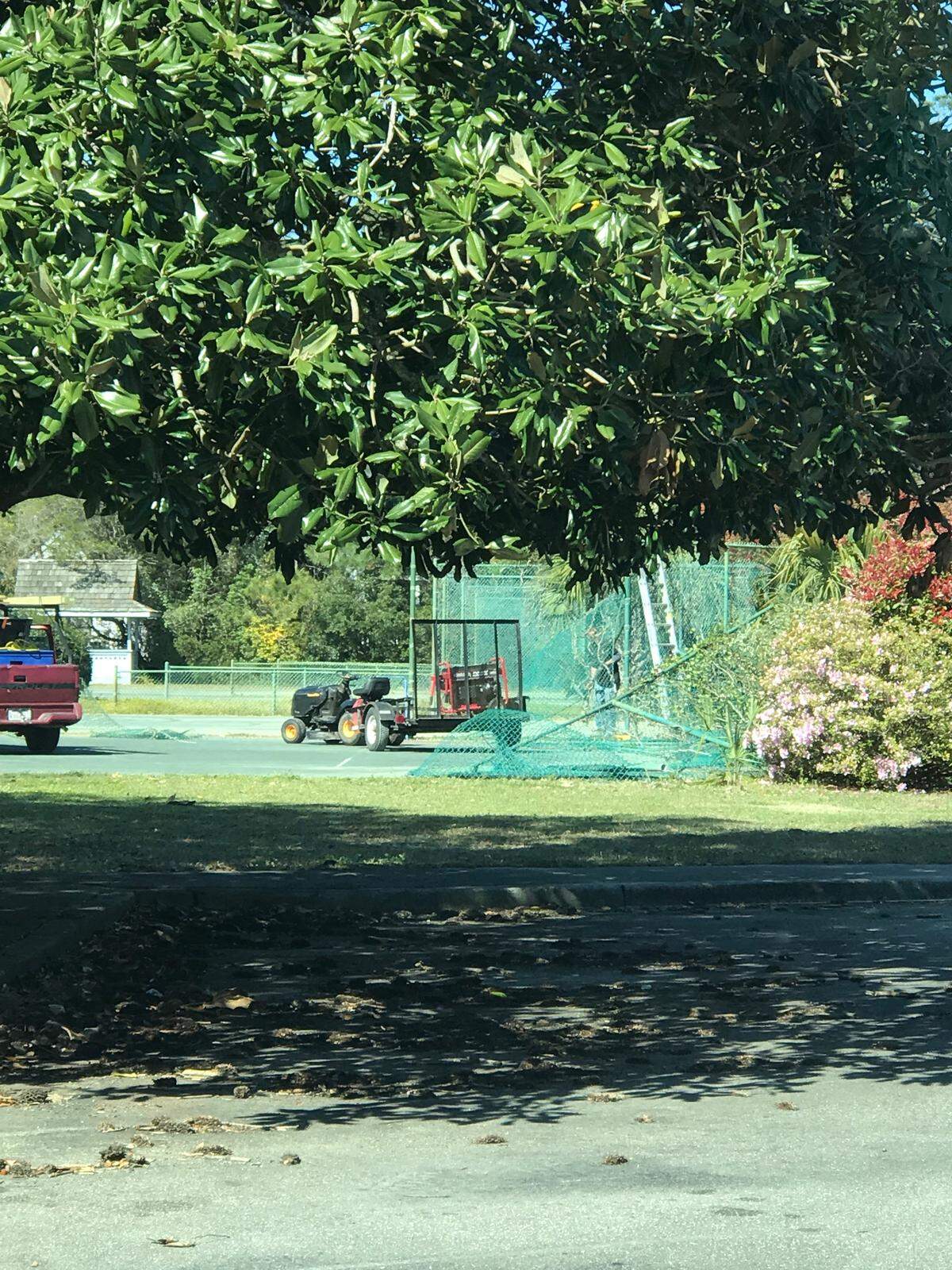Fences are taken down at the Litchfield Racquet Club earlier this month.
