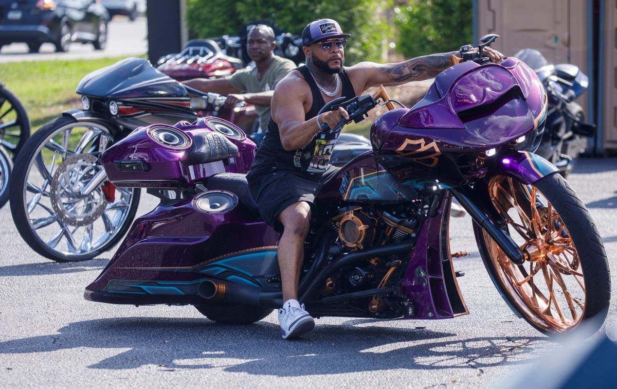 Bikers displayed their custom creations outside of Hooters at the Myrtle Beach Mall on Friday. The 2024 Black Pearl Cultural Heritage and Bike Festival, also known as Black Bike Week, came roaring into the Northern end of the Grand Strand Friday night. Bikers gathered at the Myrtle Beach Mall to show off their rides, cruised through Atlantic Beach, and partied under beach houses in North Myrtle Beach. S.C. May 24, 2024.