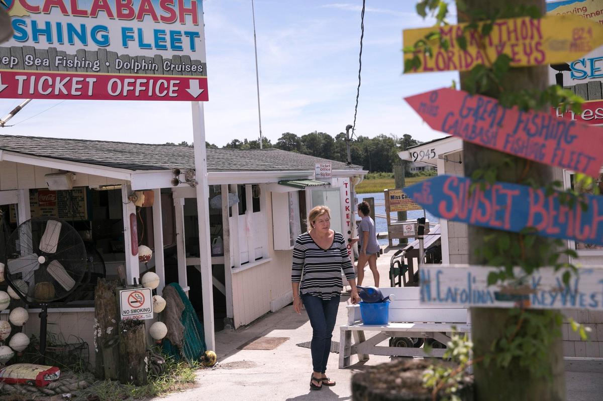 Serina Taylor was visibly upset about the damage that Hurricane Florence could inflict on the Waterfront Seafood Shack in Calabash, NC as she made final preparations on  Wednesday, September 10, 2018.
