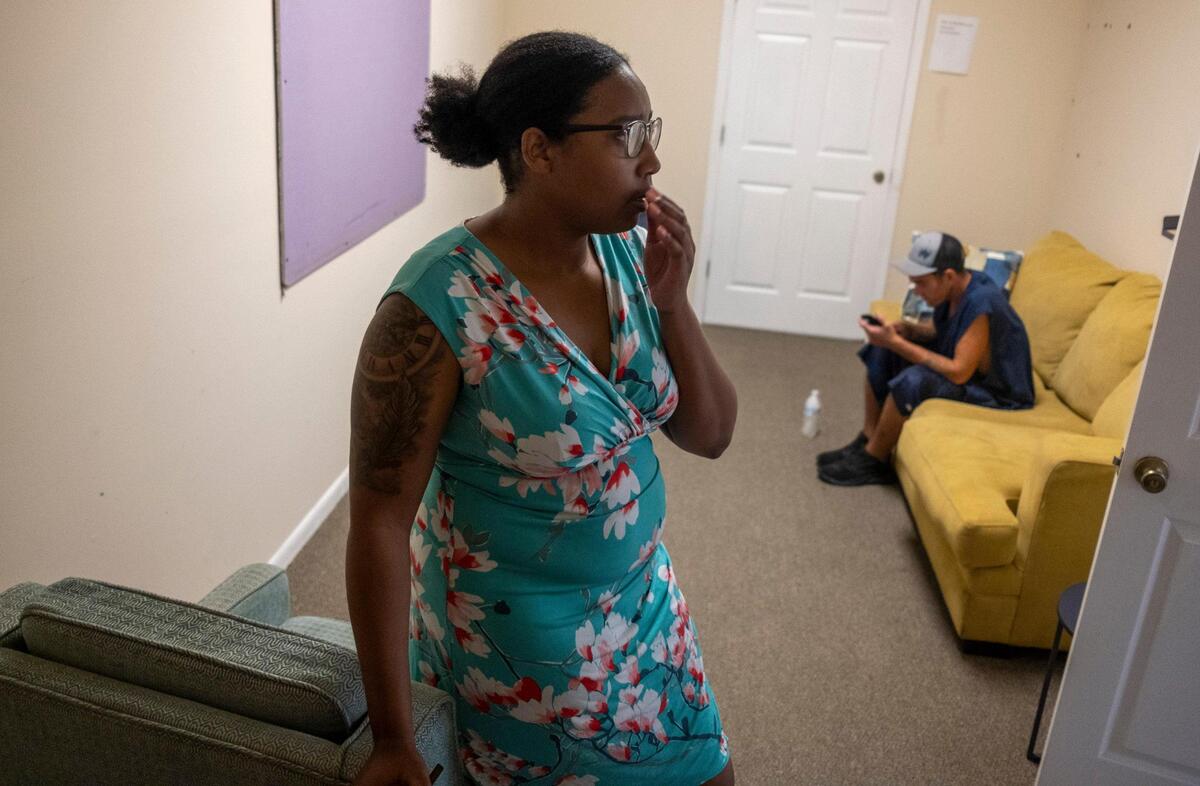 Azhane Powell, director of Fyrebird Recovery, in the center’s “living room” area contemplates the next steps for her nonprofit agency after being forced to close by the City of Myrtle Beach for improperly operating a “social welfare organization” in the arts and innovation district. The Myrtle Beach-based nonprofit primarily serves people facing homelessness and drug addiction with a focus on harm reduction and education. July 17, 2023.