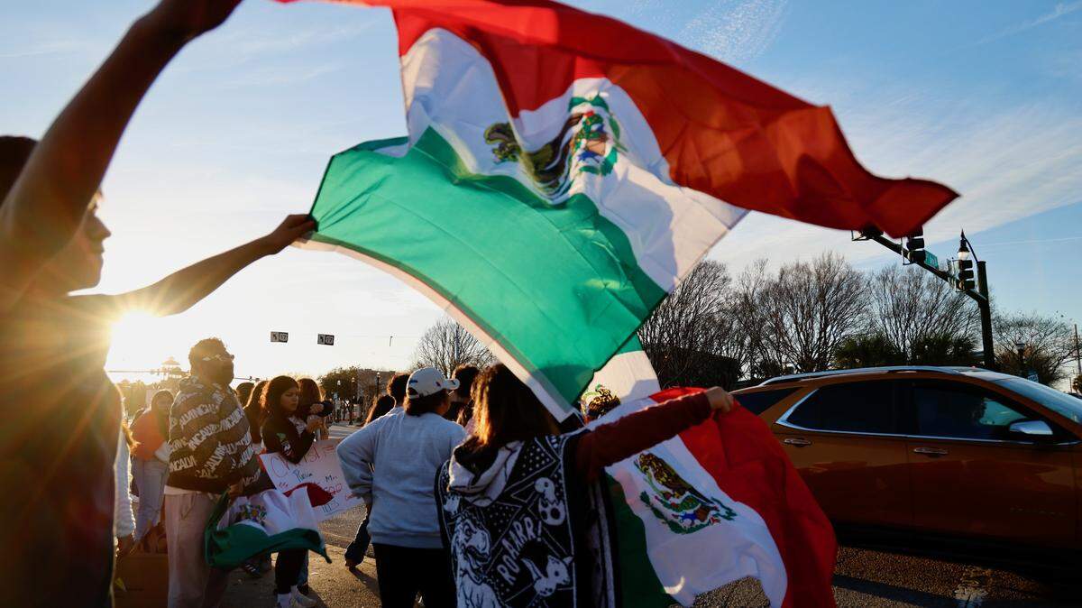 Myrtle Beach area Latinos stood on the corner of 9th Avenue North and North Kings Highway in Myrtle Beach to show the community impacted by Donald Trump’s immigration policies.