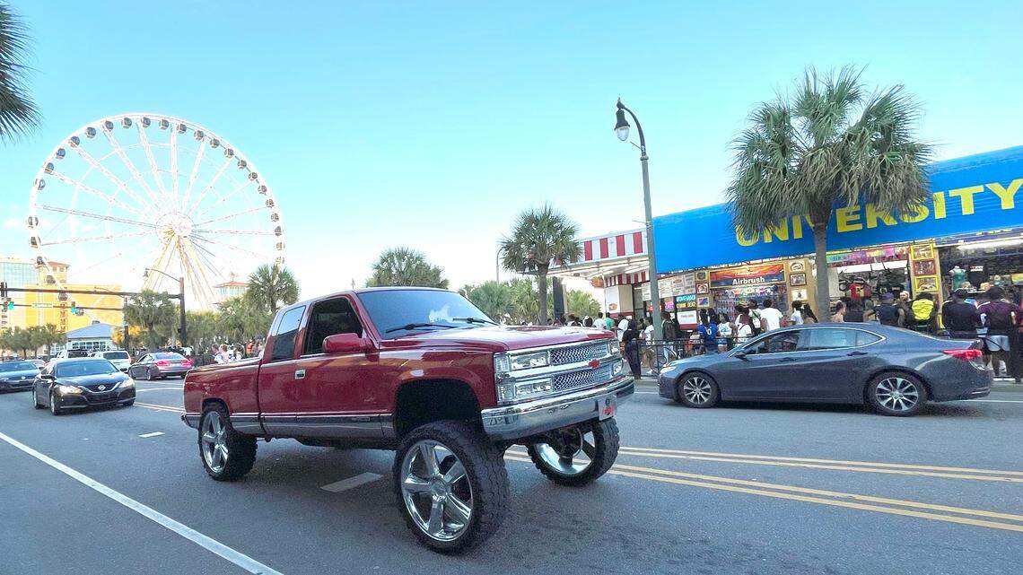 Drivers of squat trucks cruise along Ocean Boulevard of Myrtle Beach Saturday night. The trucks are under fire by police and state legislators for safety reasons. April 15, 2023