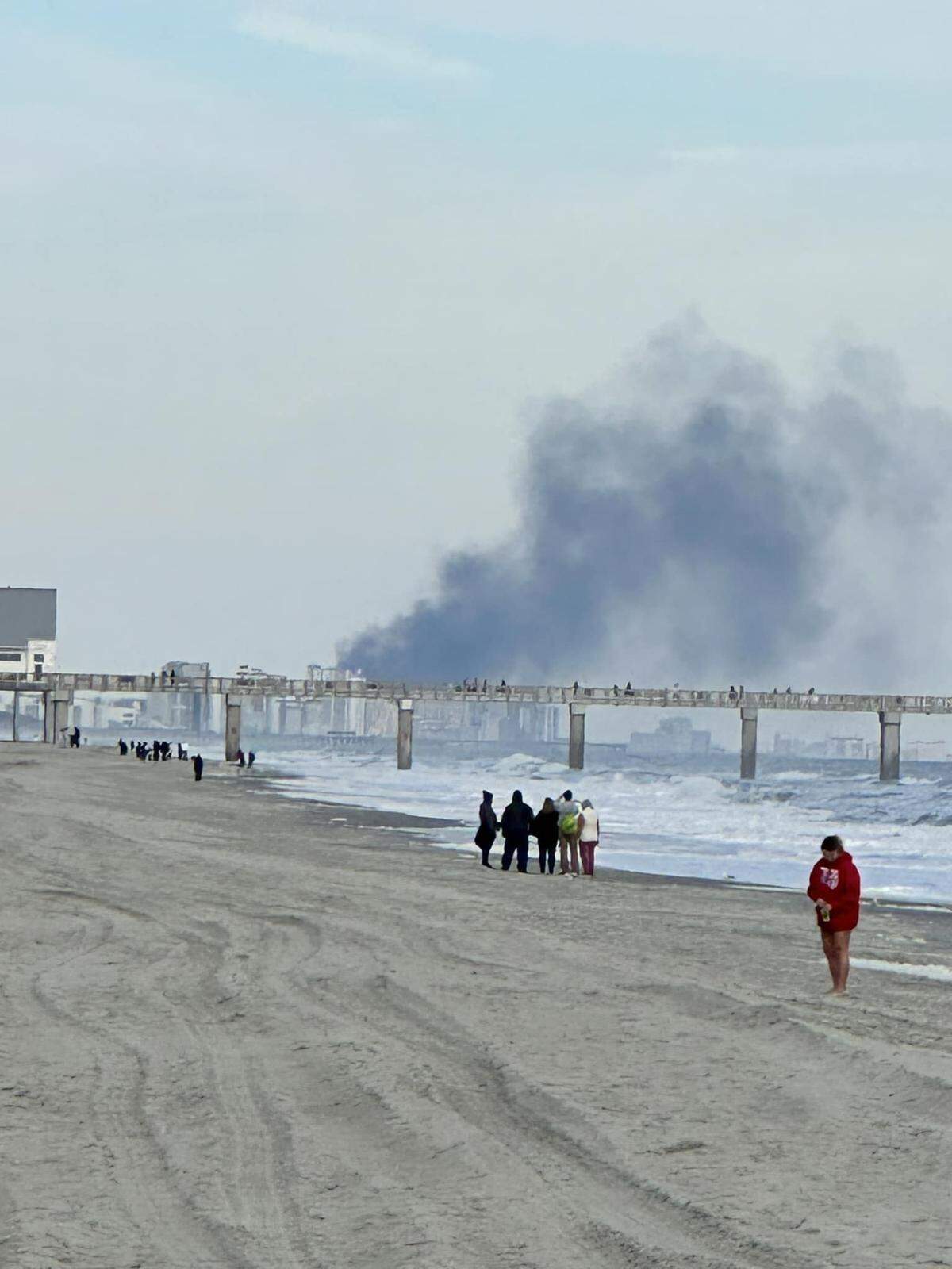 Smoke at the Atlantic Sands Rooms and Apartments was visible from the ocean in Surfside Beach on Christmas.