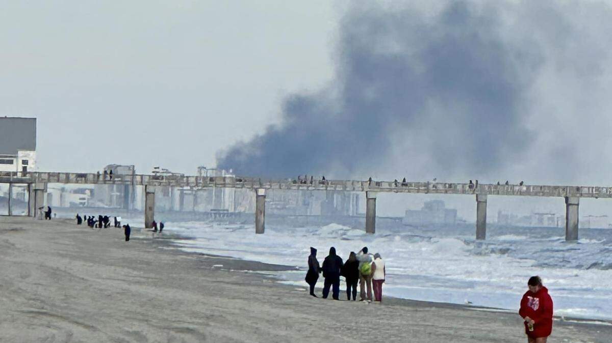 Smoke at the Atlantic Sands Rooms and Apartments was visible from the ocean in Surfside Beach on Christmas.