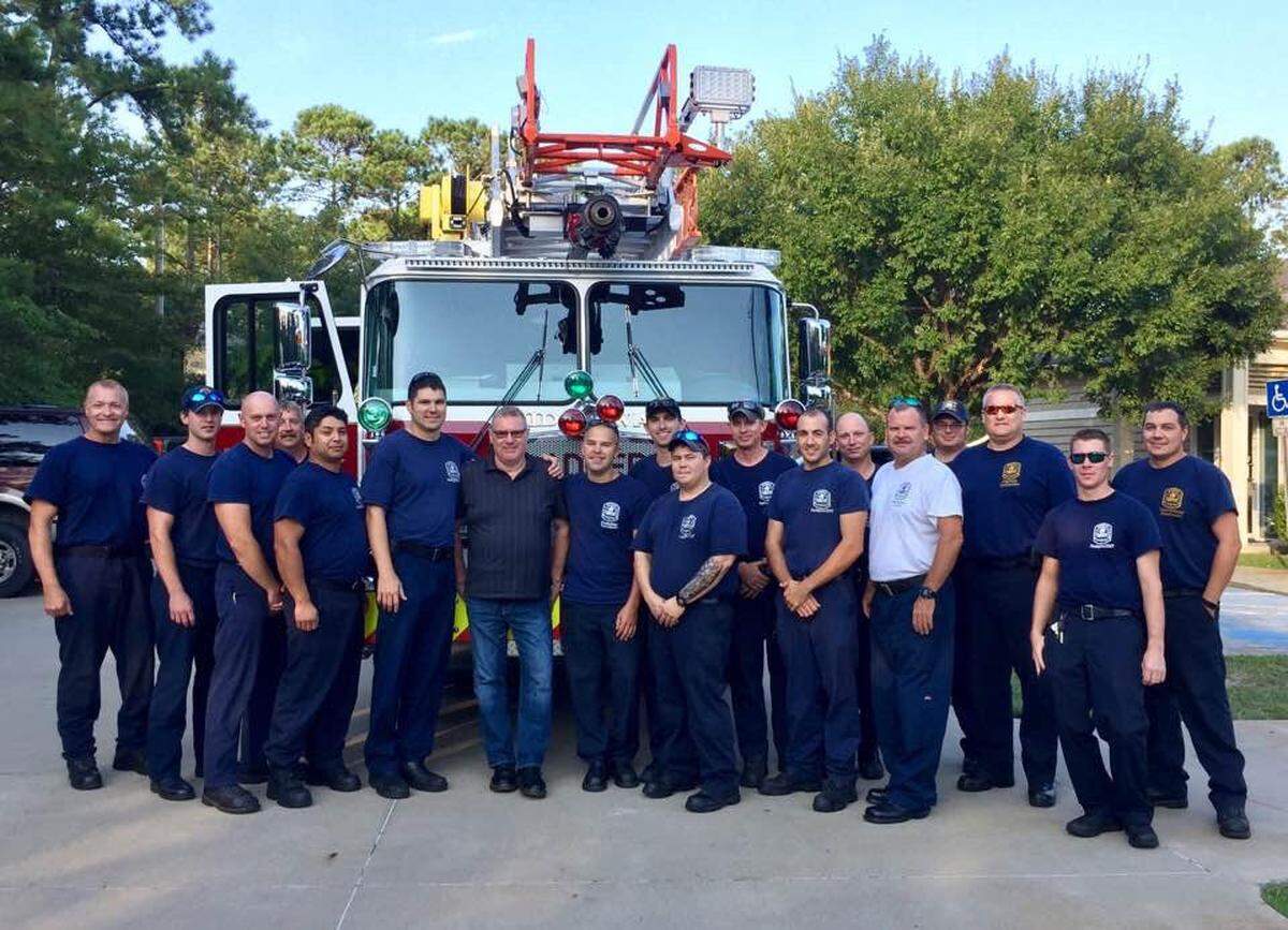 Daniel Roy, 29, located in the front row at the far right sporting sunglasses, pictured with Midway Fire Rescue