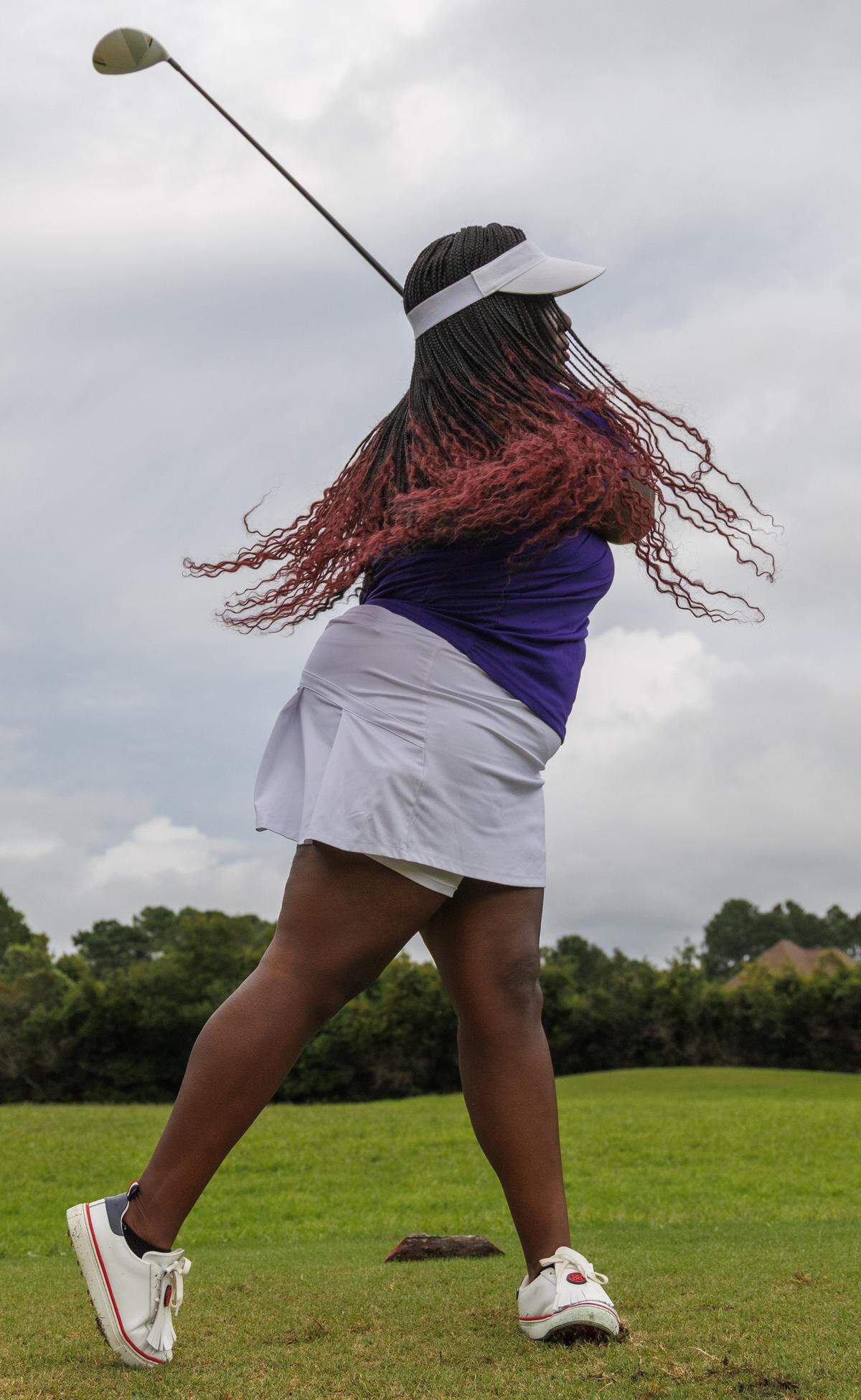 Members of the Myrtle Beach chapter of Queens on the Greens tee off for a round of afternoon play at Wild Wing Plantation in Conway, SC on August 12, 2025. The group is part of a larger organization that began in Maryland designed to offer women of color a chance to get together to play golf, learn how to play golf and socialize. The women, which range from beginners to advanced players, usually play nine holes and then go out to eat after golfing. Local chapter founder Celisse Lundy said, "There's no judgement. Just fellowship and playing golf.". Aug. 12, 2025.
