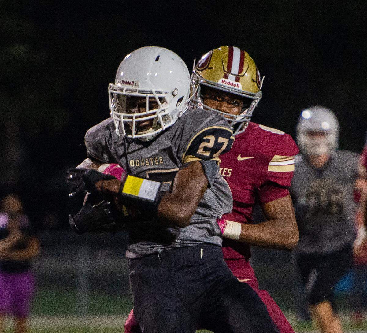 Socastee’s Tariq Hills (27) tries to break free from an Ashley Ridge defender during a scrimmage at Socastee on Sept. 18, 2020.
