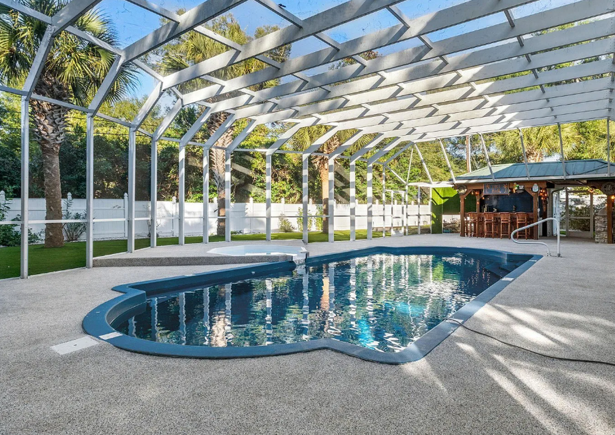 A recently listed Myrtle Beach home at 302 Kingston Road in the Arcadian Shores subdivision offers unique luxuries like a personal sauna, tiki bar, salt water pool and more.