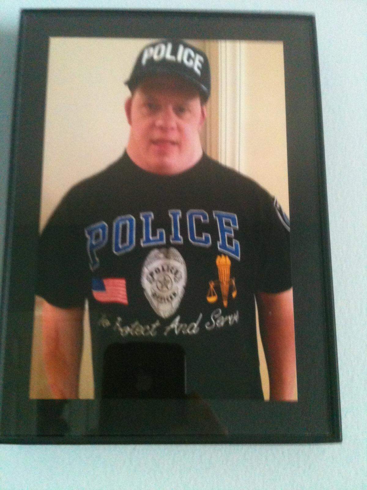 David Leperi wearing his police gear after he was made an honorary police officer in North Carolina.