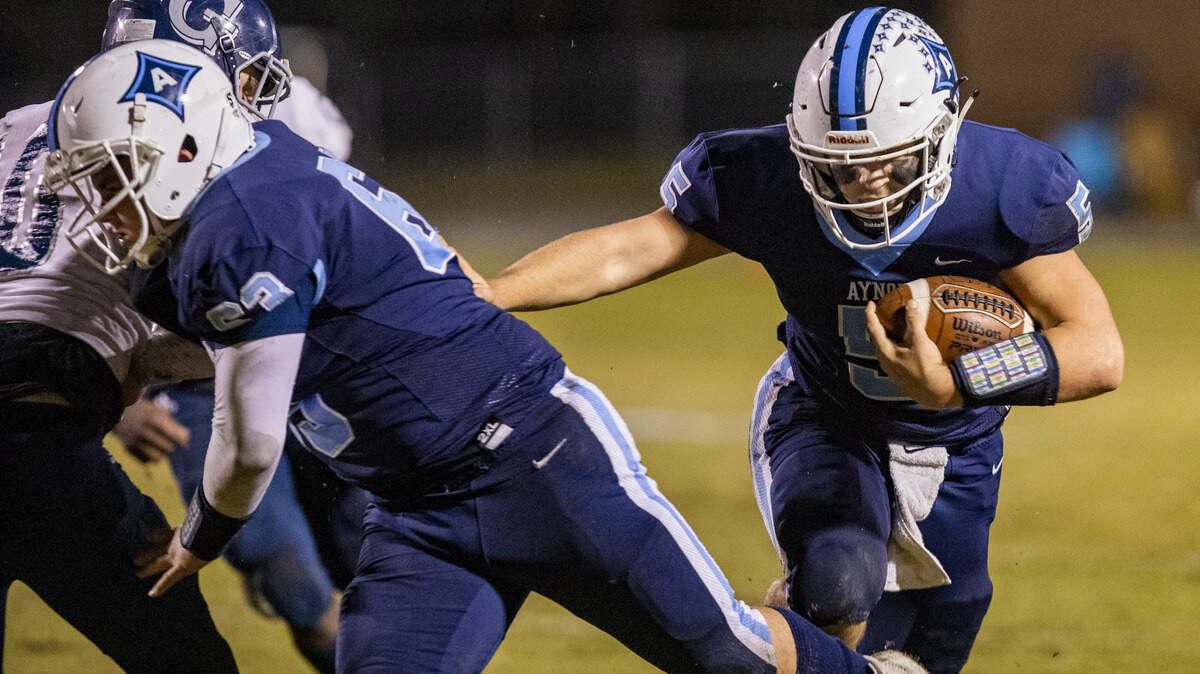 Aynor’s Noah Jones, a senior who has moved from receiver to quarterback this season, runs the ball against Georgetown during the 2019 season in Aynor.