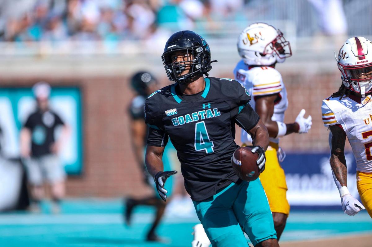 Coastal’s Isiah Likely runs back a pass for a touchdown on Saturday. The No. 16 Coastal Carolina University Chanticleers college football team defeated Louisiana-Monroe Warhawks Saturday at Brooks Stadium in Conway, SC. Oct. 2, 2021.