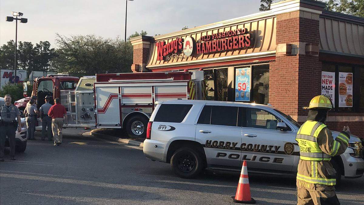 A fire truck backed into a Wendy’s restaurant in Aynor on Wednesday.
