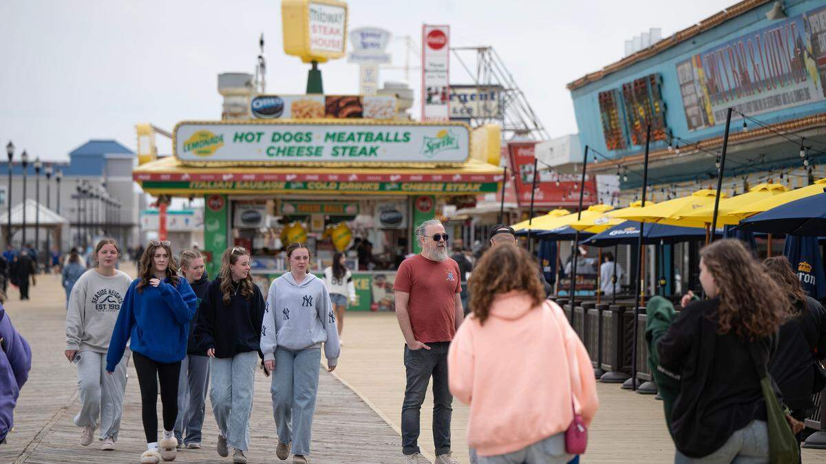 A busy boardwalk as the weekend begins. As the weather warms up, folks along the Jersey Shore head to the beach and boardwalks to enjoy the outdoors. 
Seaside Heights, NJ 
Friday, April 18, 2025