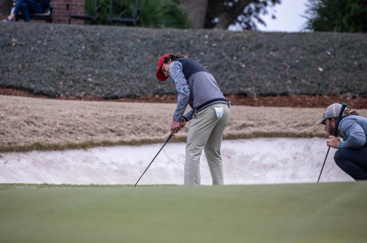 N.C. State’s Maximilian Steinlechner putts for birdie on the 18th hole at The Dunes Golf and Beach Club on Monday in the VI Sports General Hackler Championship golf tournament in Myrtle Beach, S.C. March 15, 2021.
