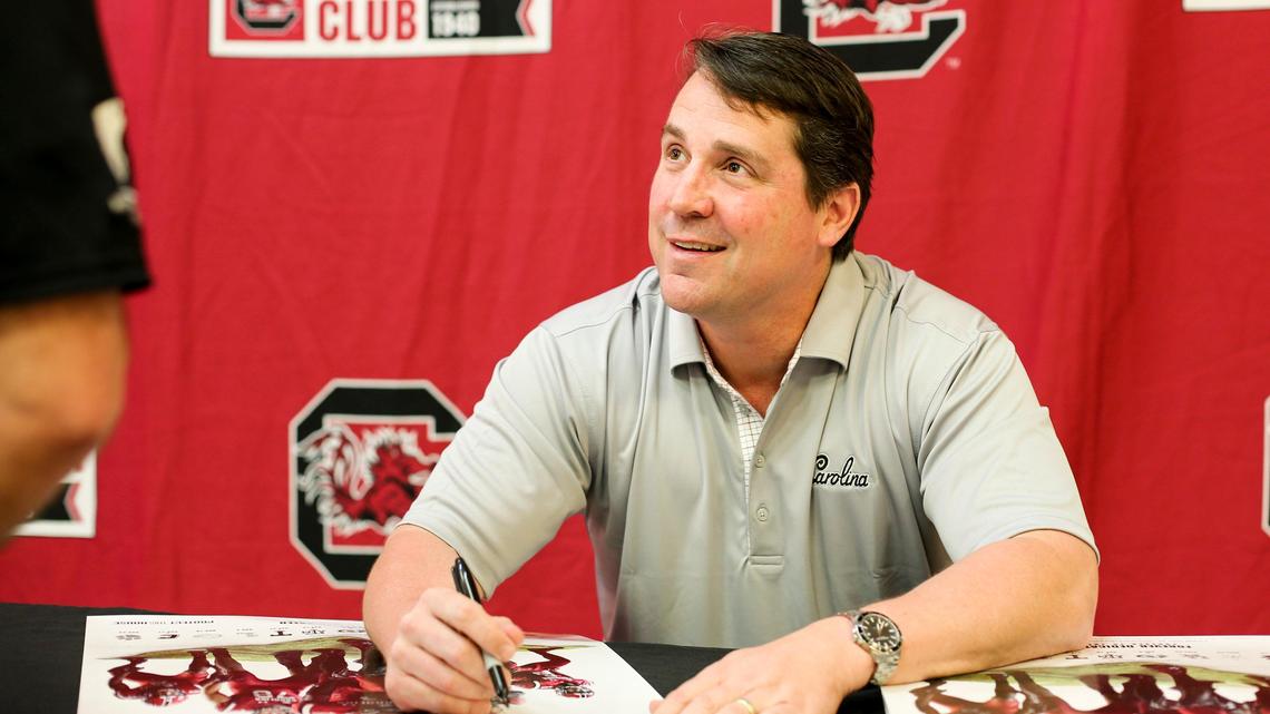South Carolina Gamecocks head football coach Will Muschamp signs autographs for fans at the Crown Reef Beach Resort and Waterpark in Myrtle Beach, S.C. on Wednesday, April 25, 2018.