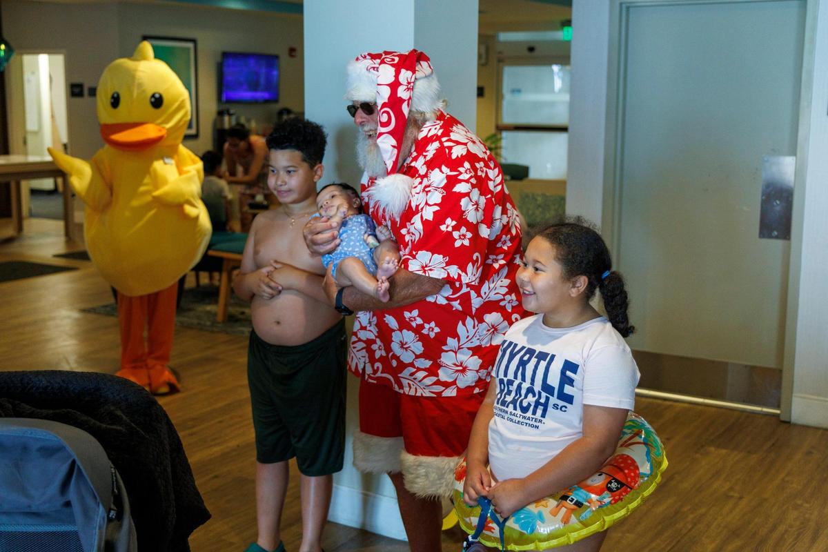 Santa Claus, or Greg Calvert, has been portraying the Jolly Old Elf since 2019. Known as Santa Greg of the Marshwalk, he uses summer to showcase what Santa does on vacation in the Myrtle Beach, making appearances at local hotels and even at karoake events. July 18, 2025.