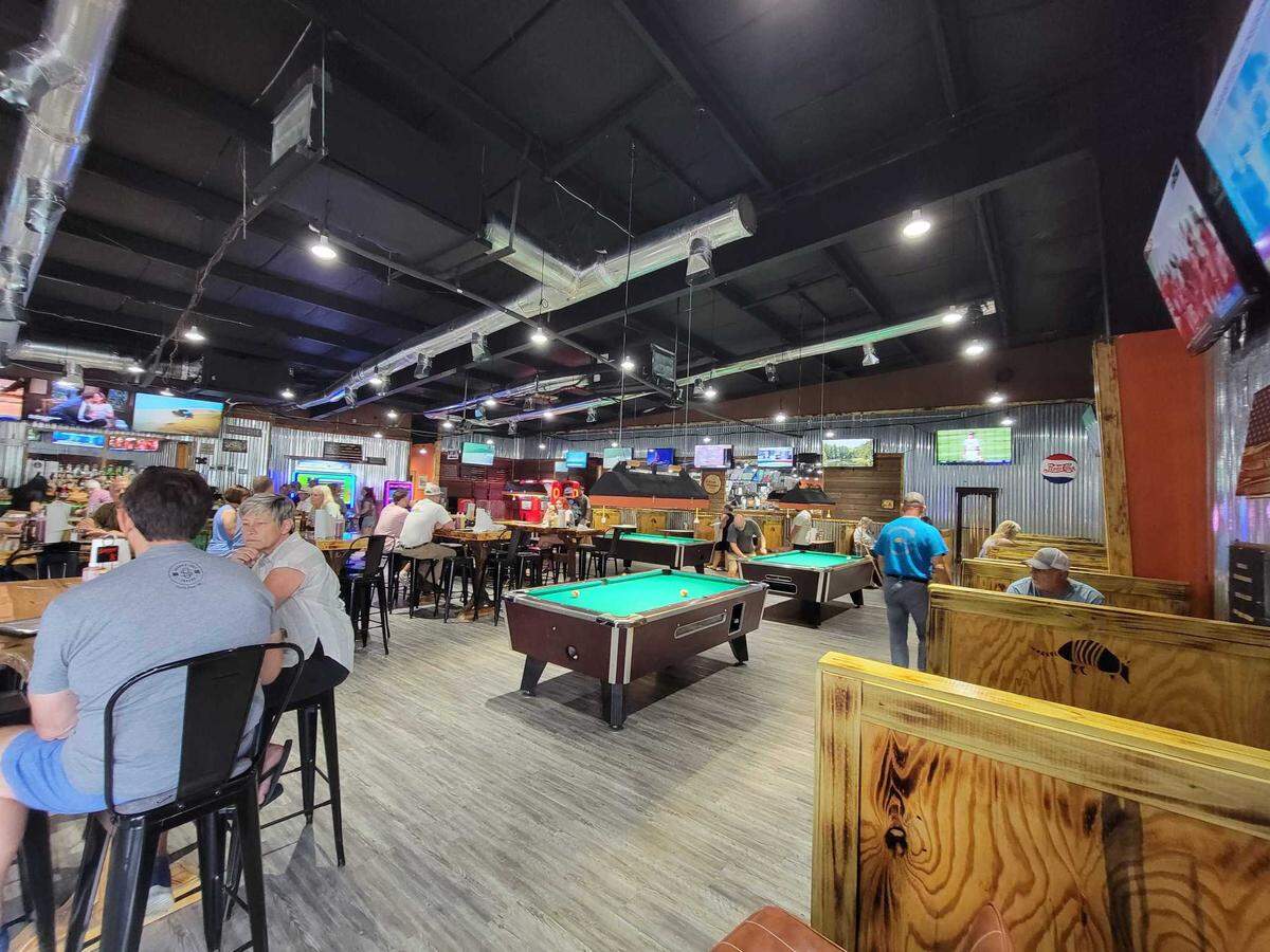 The Dirty Armadillo features food, drinks and games like pool.