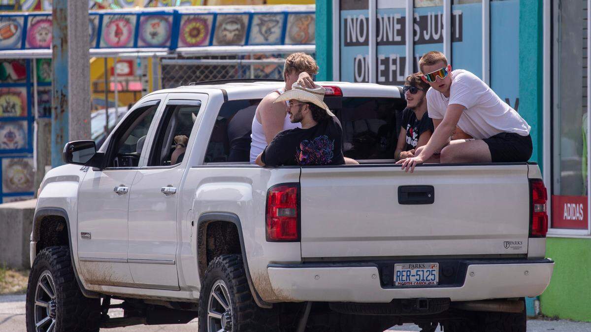 Children under 16 can ride in truck beds if an adult is present, according to North Carolina law.