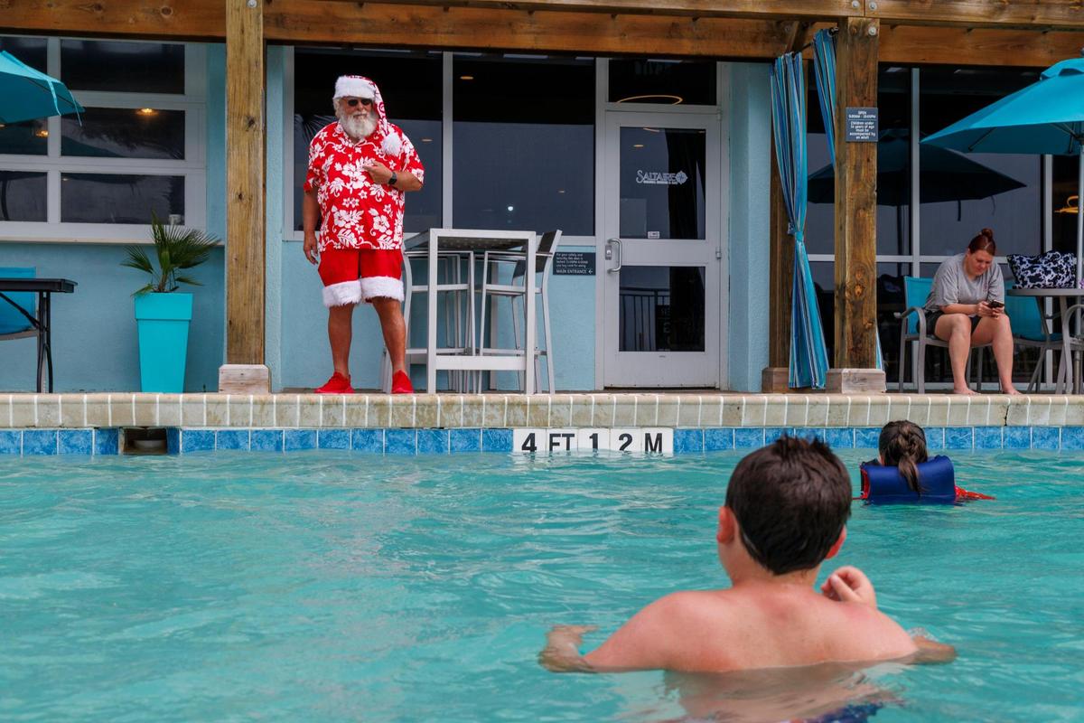 Santa Claus, or Greg Calvert, has been portraying the Jolly Old Elf since 2019. Known as Santa Greg of the Marshwalk, he uses summer to showcase what Santa does on vacation in the Myrtle Beach, making appearances at local hotels and even at karoake events. July 18, 2025.
