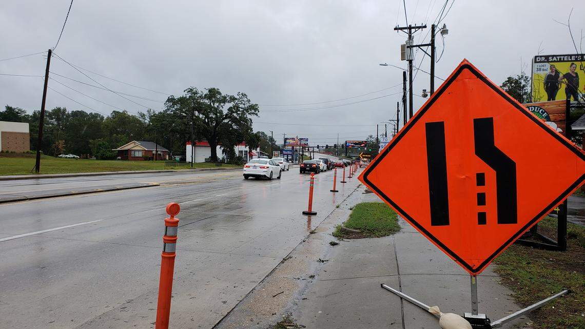 Transportation officials have turned U.S. 501 over Lake Busbee in Conway into a one-lane road going each way as they prepare to build a temporary flood control device to divert expected flooding from Tropical Storm Florence.