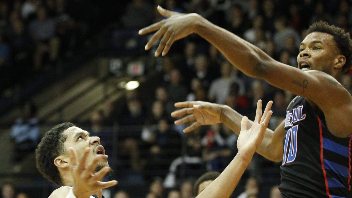 Tre'Darius McCallum, right, averaged 9.9 points and 6.3 rebounds per game in two seasons at DePaul.
