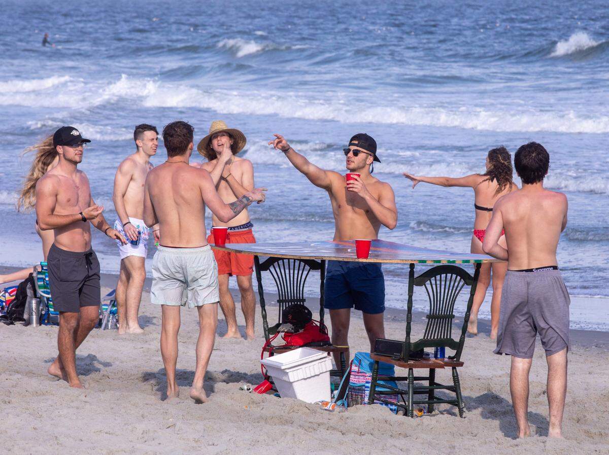With government officials warning people to take caution and self quarantine, hundreds of college students, many from Coastal Carolina University, were partying on 65th Avenue North in Myrtle Beach on Thursday. March 19, 2020.