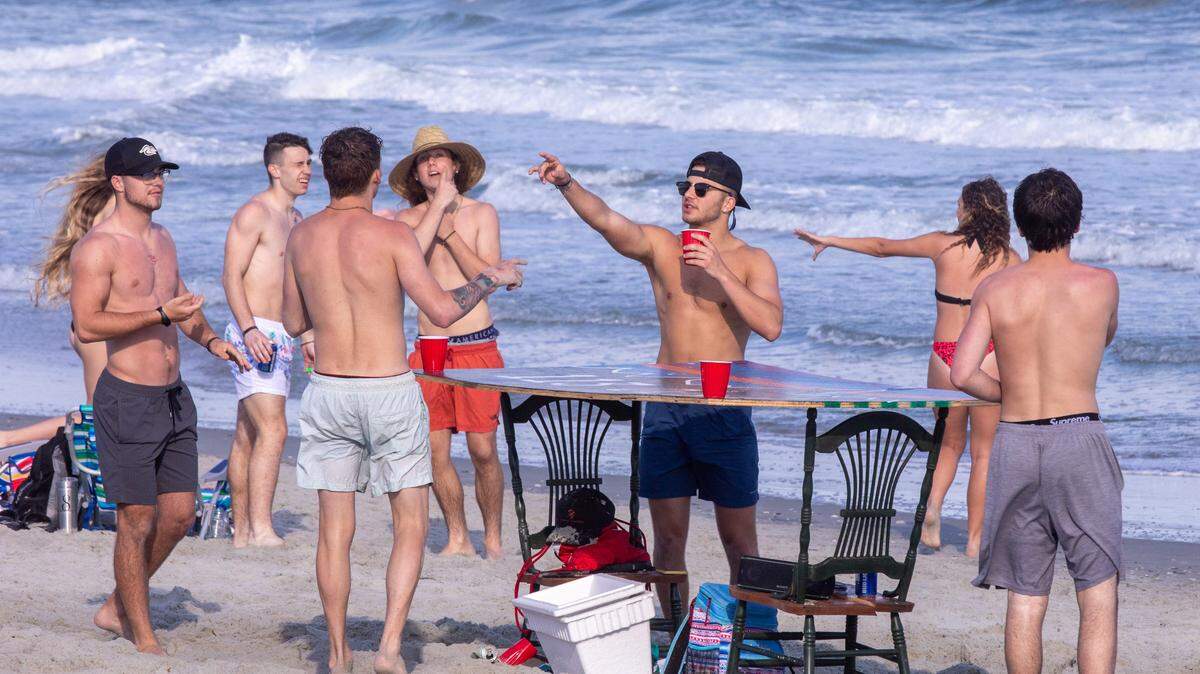 With government officials warning people to take caution and self quarantine, hundreds of college students, many from Coastal Carolina University, were partying on 65th Avenue North in Myrtle Beach on Thursday. March 19, 2020.