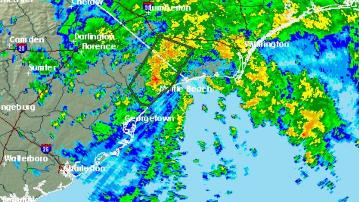 The box in the radar shows a flash flood warning for parts of Horry County through 12:15 pm.