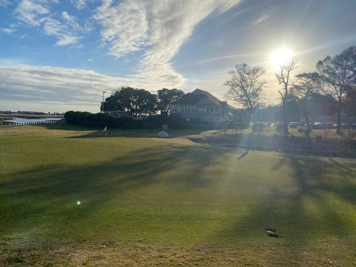 The 18th green and clubhouse at Lockwood Folly Country Club in Holden Beach, N.C., which is undergoing renovations as part of a long-term improvement plan.