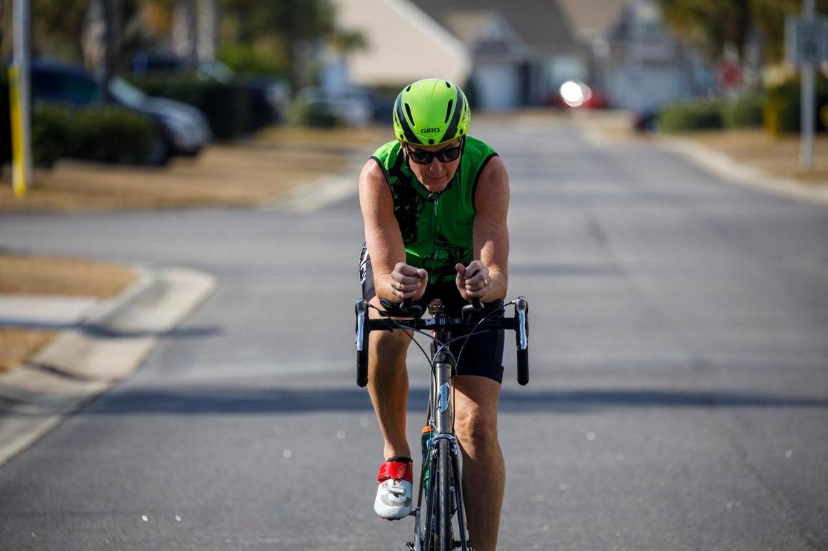 Dr. James Mahaffey, age 64, of Surfside Beach, SC trains in preparation for the 2021 Ironman Triathlon World Championship to be held in St. George, Utah in May. The race will be Mahaffey’s 33rd full distance Ironman Triathlon, which consists of a 2.4 mile swim, 112 mile bike, and 26.2 mile marathon run. February 04, 2022.