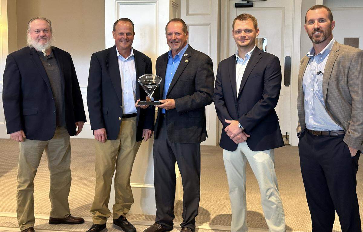 From left to right, Prestwick Country Club superintendent Paul Kaufman and general manager Jay Smith, South Carolina Golf Course Owners Association President Rock Lucas, Prestwick Country Club head golf professional Ryan Wilkinson and Jackson Companies CFO Dustin Formo pose with the 2025 South Carolina Golf Course of the Year award.