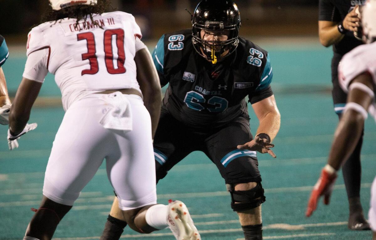 Coastal Carolina’s Trey Carter sets up on the offensive line against South Alabama at Brooks Stadium in Conway on Nov. 7, 2020.