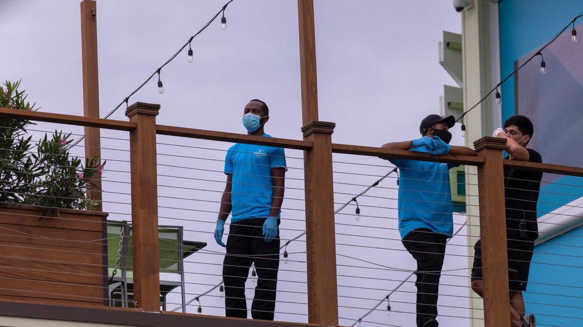 Restaurant workers wait on customers at RipTydz on Tuesday evening July 17, 2020. Since the COVID-19 pandemic, the Myrtle Beach area has experienced extreme shortages of hospitality workers.