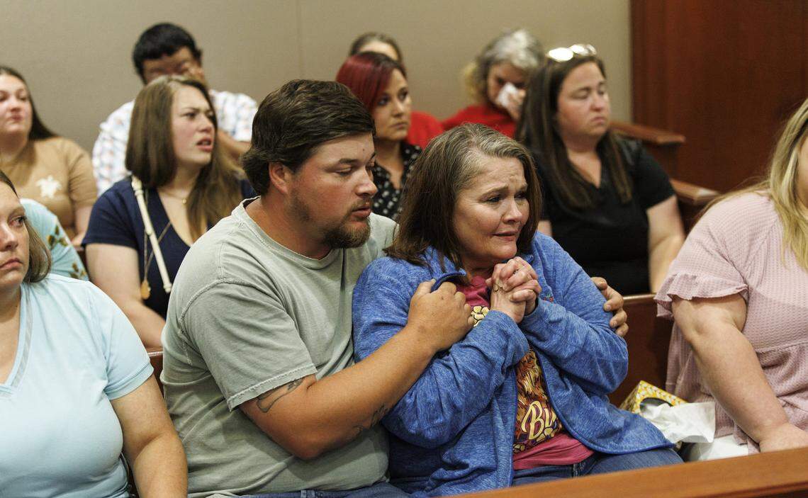 Lisa Greenwood, mother of 33-year-old Paul Jones Greenwood who was killed in a shooting after a traffic accident on Highway 90 in January 2026, sits with family members as  bond hearing was held today for Elijaih Thurman Taylor, who is charged his murder. Taylor was denied bond in an emotional hearing in Horry County court. April 16, 2026.